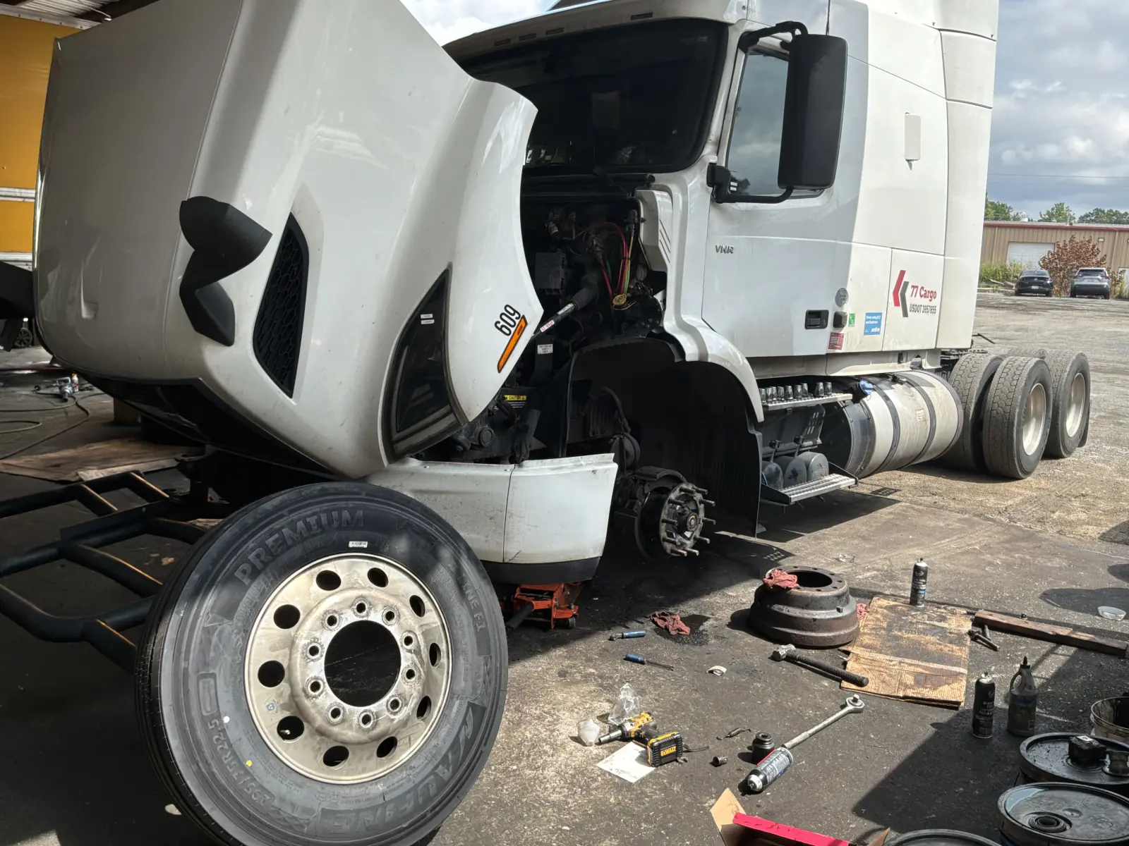 2020 Volvo VNR undergoing front-end repair at Truck Pit Stop near Charlotte