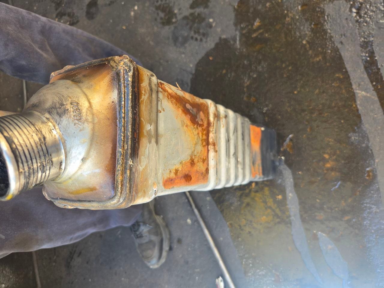 Volvo D13 EGR Cooler Failure: Why the Surge Tank Bubbled 3 Removed failed EGR cooler from the Volvo D13 truck