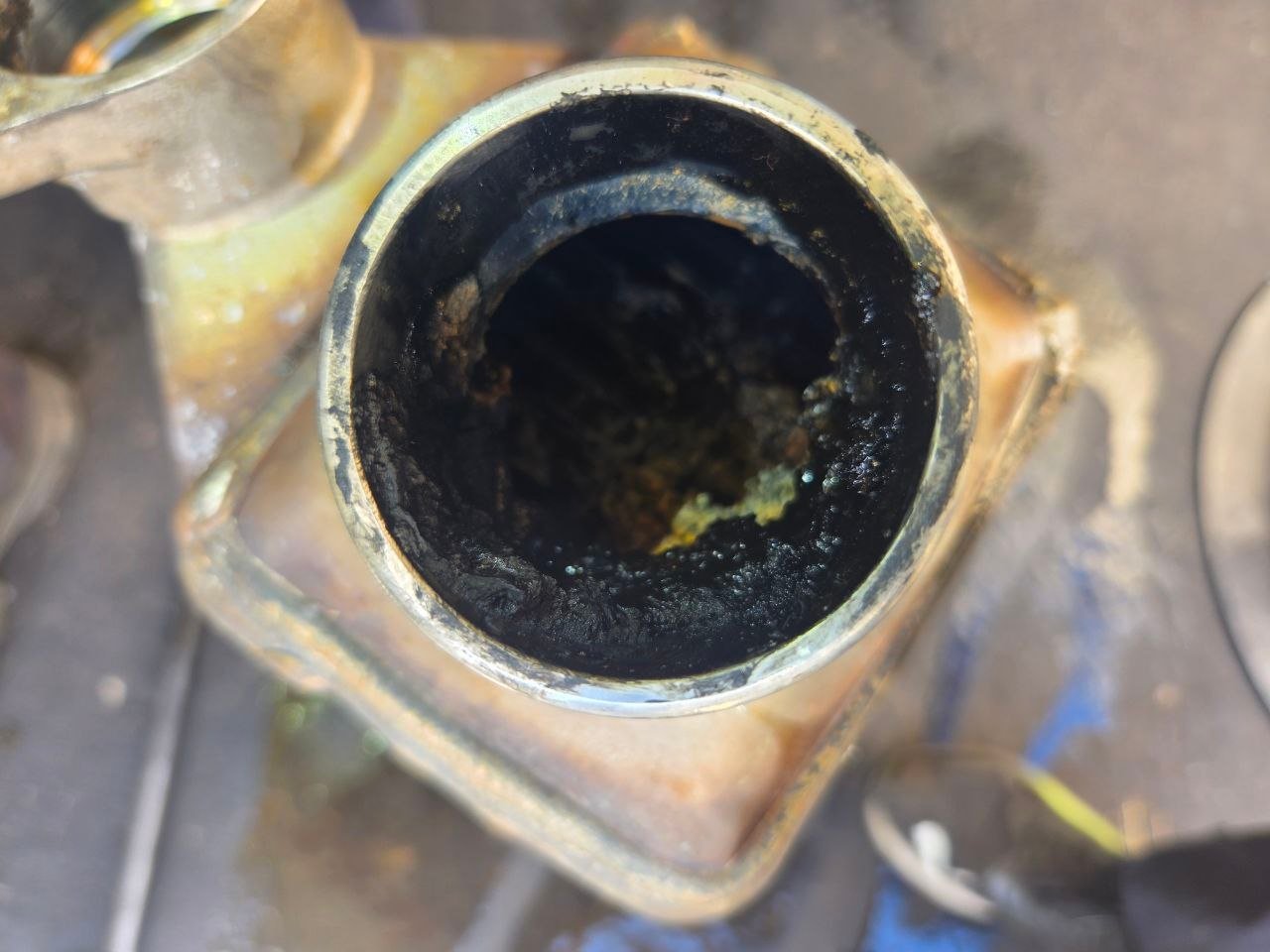 Volvo D13 EGR Cooler Failure: Why the Surge Tank Bubbled 2 Heavy soot inside the gas-side opening of the failed Volvo D13 EGR cooler
