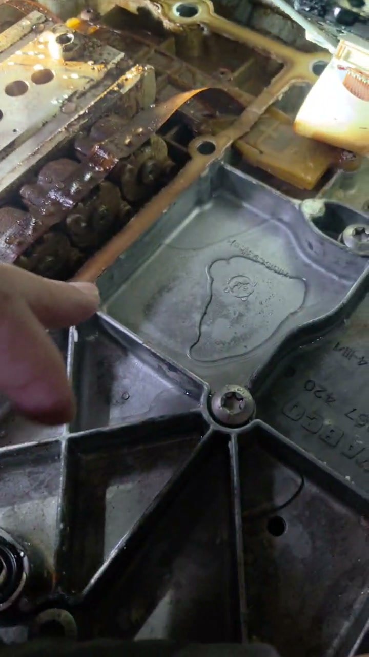 Close-up of opened truck transmission assembly being examined at Truck Pit Stop