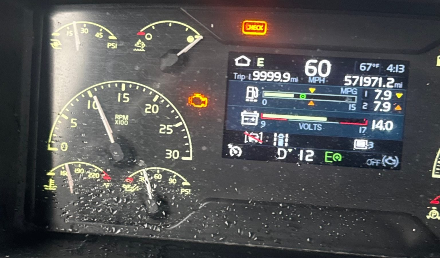 SPN 5246: SCR Inducement Derate (Why Your Truck Is Limited to 5 MPH and How to Get It Back) 1 Semi truck dash at 60 mph with the check engine lamp on, the kind of fault that leads to an SCR inducement derate